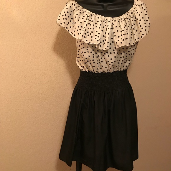 black dress with polka dots